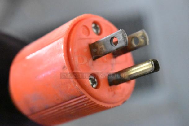 Stainless steel commercial ice machine plug, orange casing, slightly worn. Model Hoshizaki KM-501MWH, 115 volts, 1 phase.