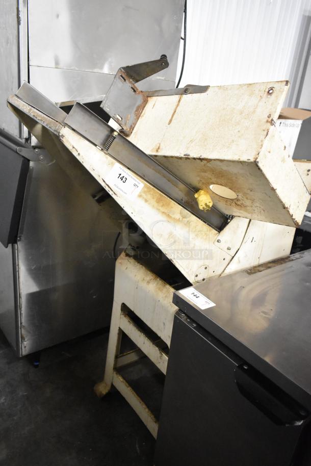 Mimax metal commercial bread loaf slicer, floor style, visible wear, 115 volts, 1 phase, auction tags attached.