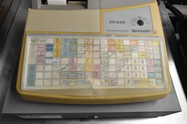 Sharp ER-A420 countertop cash register with multi-colored keys, visible wear. Model ER-A420 label intact, functional condition.