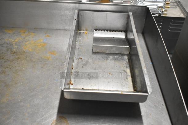 Toastmaster Pro Series Stainless Steel Griddle, commercial, flat top, thermostatic controls, visible wear, durable design.