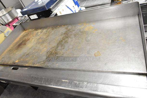 Toastmaster Pro Series Stainless Steel Flat Top Griddle, electric, thermostatic controls, worn surface, commercial use.