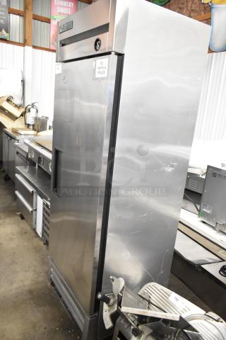 2017 True T-19F stainless steel commercial freezer, single door, poly coated racks, 115V, with visible exterior scratches.
