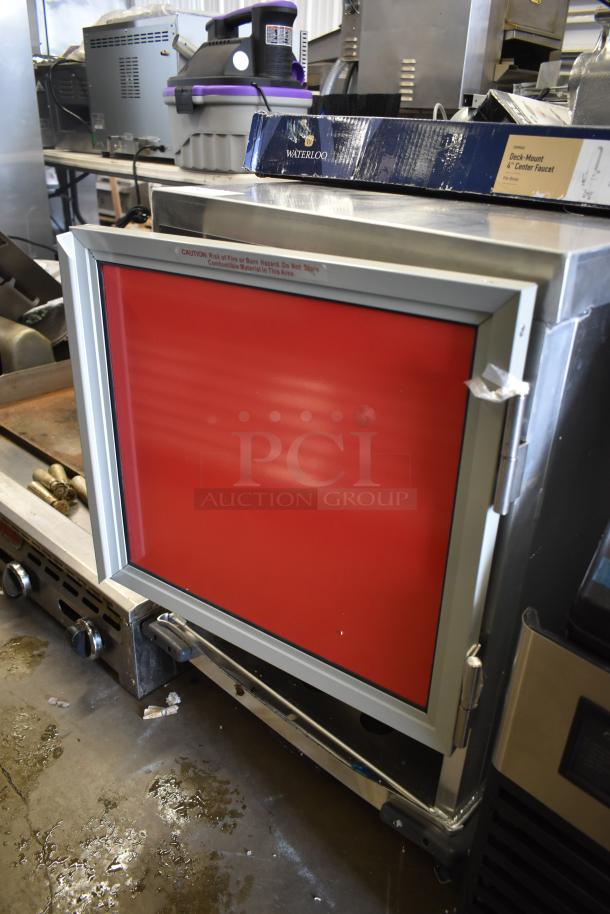 Brand new Avantco metal heated holding cabinet on commercial casters, 120 volts, 1 phase, minor scratches and dents.