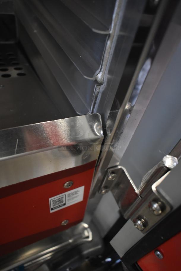 Avantco heated holding cabinet, brand new, with scratch and dent. Features metal construction, commercial casters, and visible tags.