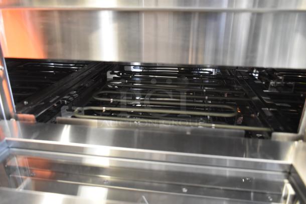 Brand new Avantco 177DPO18DD stainless steel double deck countertop pizza/bakery oven, 240V, with two independent chambers.