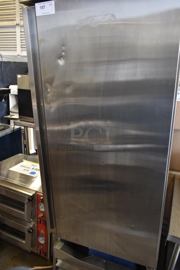 Avantco 178CFD1RR Stainless Steel Commercial Single Door Reach In Cooler, visible dents, poly-coated racks, 115V, 1 Phase.