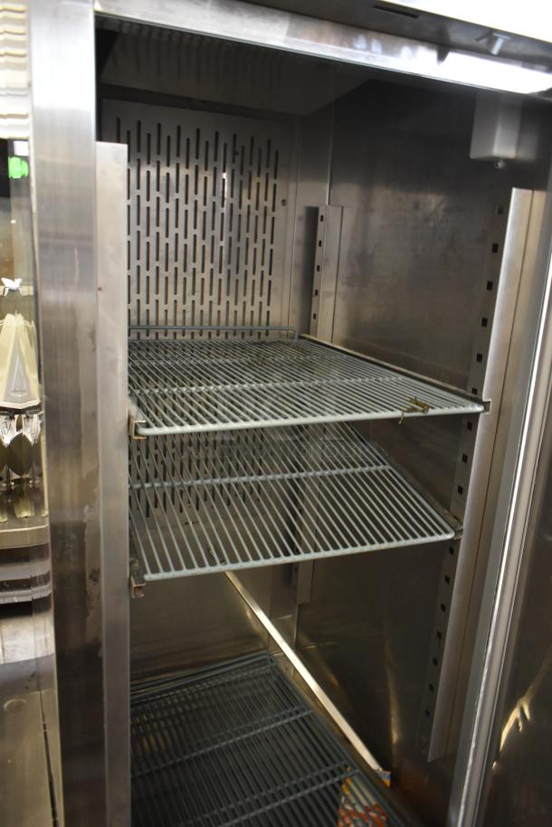 Avantco 178CFD1RR stainless steel commercial single-door cooler, equipped with poly-coated racks. 115 volts, 1-phase.