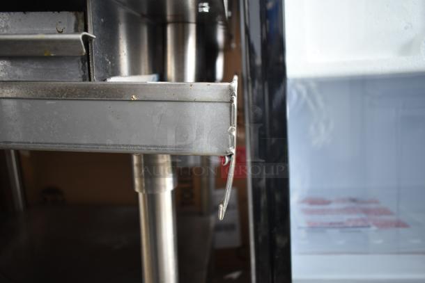 Vulcan VACB25-101 stainless steel charbroiler grill corner, mounted on equipment stand, industrial-grade, natural gas.