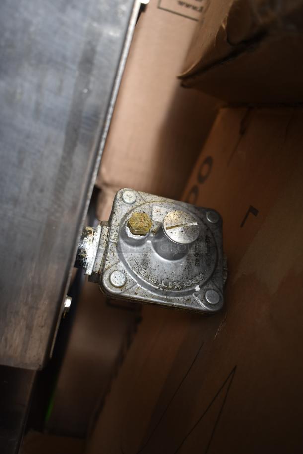 Vulcan VACB25-101 stainless steel gas charbroiler grill, showing control valve. Markings indicate natural gas use.