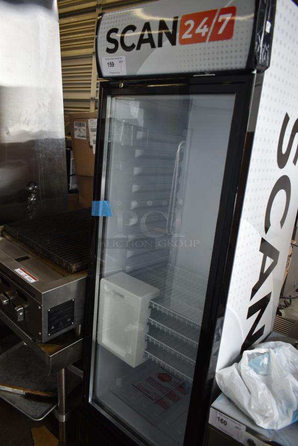 Brand new KoolMore MDR-9CP metal single door cooler, poly coated racks, 115V, 1 phase, slight dents, tags visible.