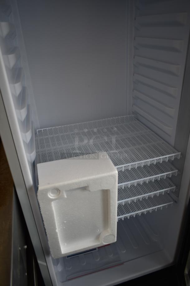 BRAND NEW KoolMore MDR-9CP commercial cooler, single door, with poly-coated racks, showing interior and protective packaging.