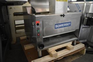 Brand new Somerset CDR-250 stainless steel dough moulder, countertop model for 6-20" loaves, 115V, minor scratches.