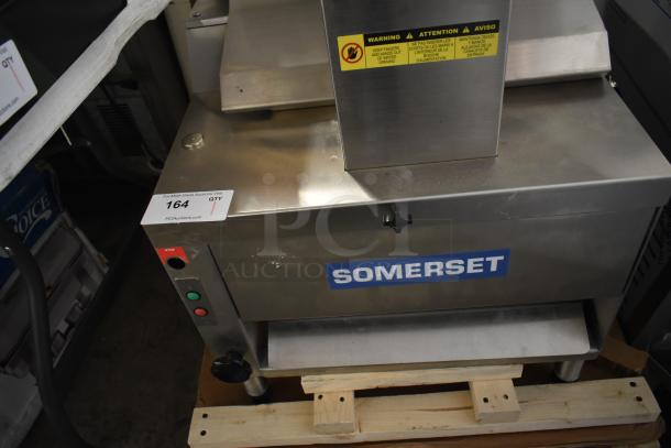 Brand new Somerset CDR-250 dough moulder, stainless steel, scratches visible, for 6-20" loaves, 115V, 1 phase.