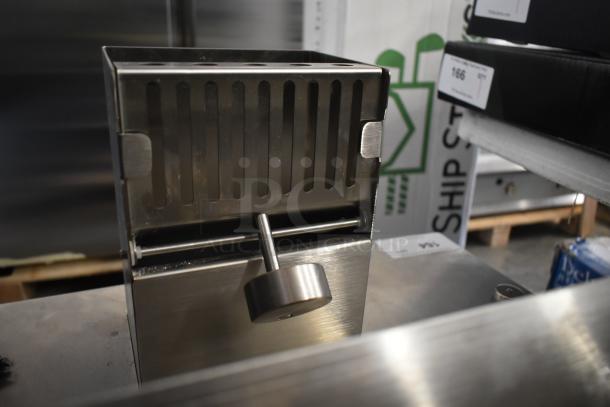 Brand new Somerset CDR-250 stainless steel dough moulder for 6-20" bread loaves, 115 volts, shown in a scratch and dent condition.