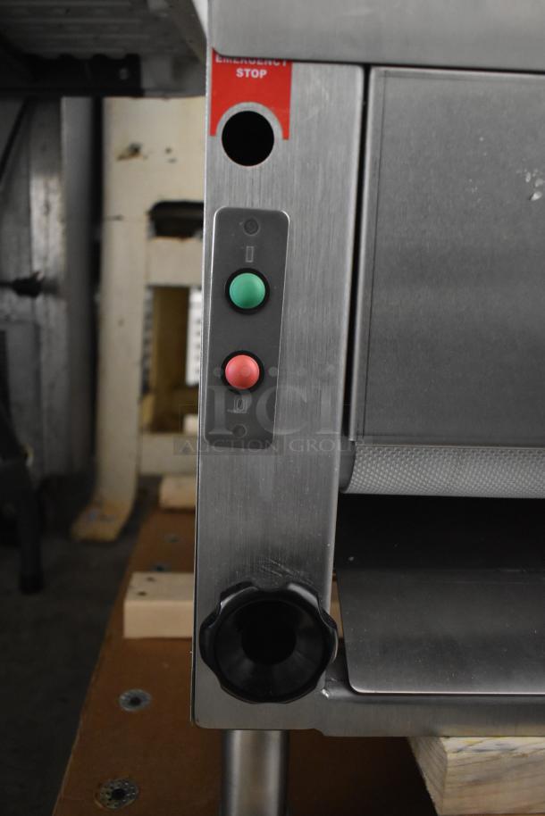 Somerset CDR-250 dough moulder, stainless steel, countertop model for 6-20" loaves, 115 volts, new with minor dents.