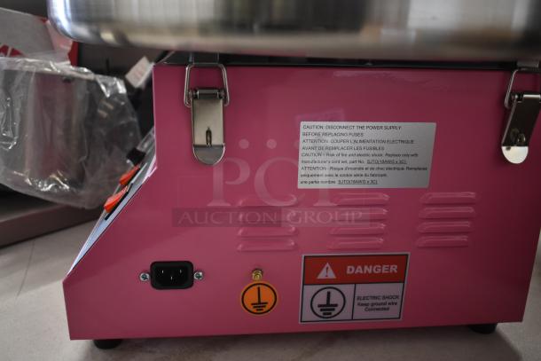 BRAND NEW 2025 Carnival King 382CCME21 Metal Cotton Candy Machine with 21" stainless bowl, 110V, pink exterior, caution labels.
