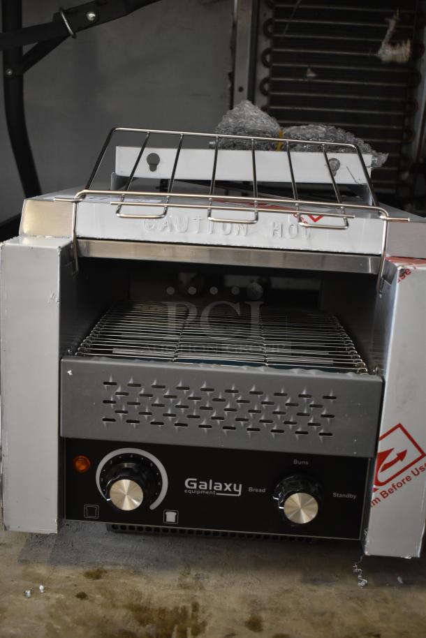 Brand new Galaxy 177GCT10 stainless steel conveyor toaster, 3" opening, 120V, 1-phase, with minor scratches and dents.
