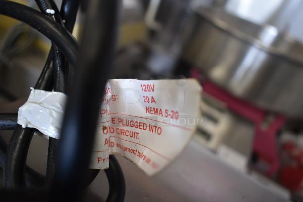 Brand new Solwave SWAHD12 commercial microwave tag showing 120V, 20A, and NEMA 5-20 plug information.