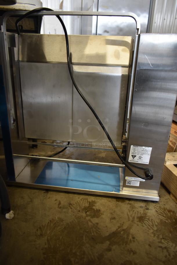 Brand new Prince Castle 297-T12P stainless steel vertical contact toaster, slight scratches, 1440 buns/hour, 115V, 1 phase.