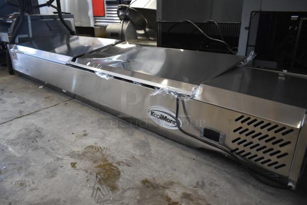 Brand new KoolMore SCDC-8P-SSL stainless steel refrigerated condiment prep station, 71-inch, eight pan capacity, 115V.