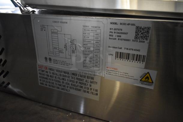 KoolMore SCDC-8P-SSL prep station label showing model, voltage, and refrigerant details with warning instructions.