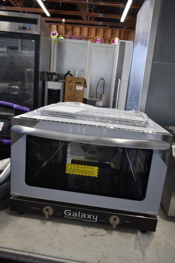 Brand new Galaxy 177COE3H stainless steel half-size countertop convection oven, 120V, 1-phase, with minor cosmetic imperfections.