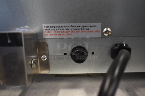 BRAND NEW Galaxy 177COE3H stainless steel convection oven, half size, 120V, with high temp reset instructions visible.