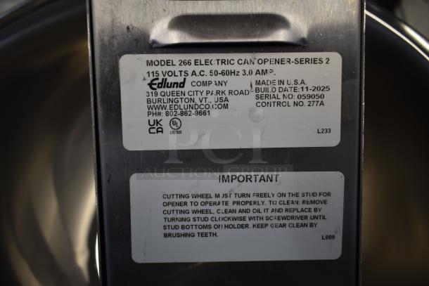 Edlund 266 Electric Can Opener label, 115V, Model 266, USA-made, new condition, includes care instructions.