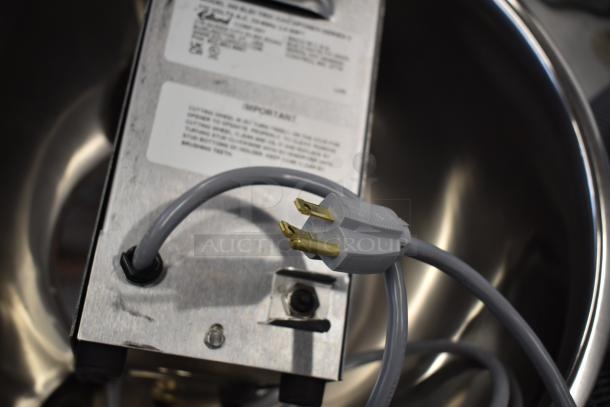 Edlund 266 electric can opener, scratch and dent, new condition, tabletop design, visible power cord and metal bowl.