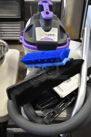 Brand new ProGuard 1071281 wet dry vacuum, 120V, with hoses, brushes, and manual. Scratch and dent condition.