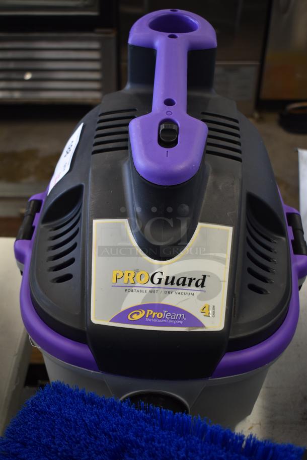 BRAND NEW ProGuard 1071281 wet dry vacuum cleaner, 120V, 1 phase. Slight scratches, 4-gallon capacity. ProTeam label visible.
