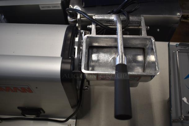 Brand new Sirman GF Dakota 20021608WNA hard cheese grater, 2 lb/min, 120 volts, minor scratch and dent.