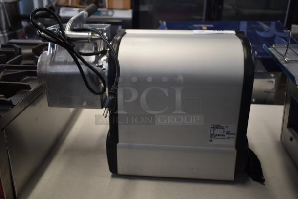 Sirman GF Dakota 20021608WNA electric hard cheese grater, 120 volts, new condition, scratch and dent, 2 lb./min capacity.