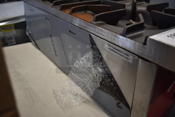 BRAND NEW Avantco 177CAGR212 2 Burner Natural Gas Range, 50,000 BTU, scratch and dent condition with packaging.