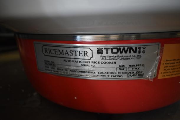 Brand new RiceMaster RS-50N-R gas rice cooker, 110 cup capacity, 34,600 BTU. Scratch and dent; model label visible.