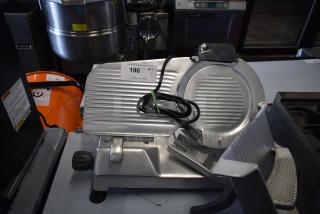 BRAND NEW Hobart EDGE10-11 stainless steel meat slicer, 10" blade, countertop model, includes blade sharpener. 115V, 1 phase.