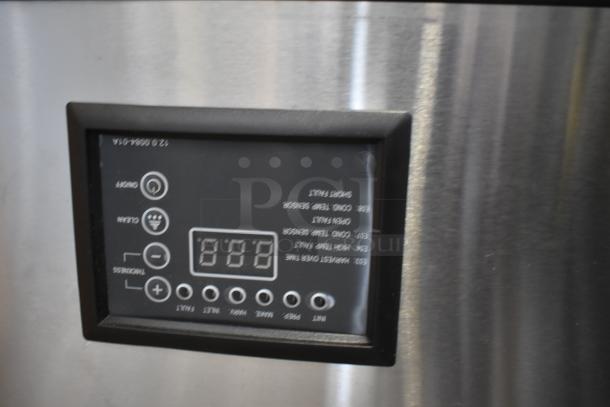 Stainless steel control panel of Avantco 194UCF280A ice machine, new with minor dents, digital display, clear labeling.