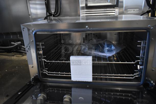 Cadco XAF013-US stainless steel convection oven, new, scratch and dent, 120V, 1 phase, electric countertop model.