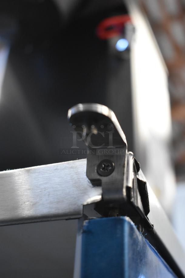 Hoshizaki AM-50BAK stainless steel ice machine, new with minor scratches, featuring a 27 lb. bin and 54 lb. capacity.