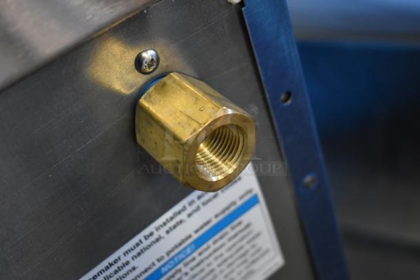 Brand new Hoshizaki AM-50BAK stainless steel ice machine with brass fitting, visible label; top hat cube design, scratch and dent.