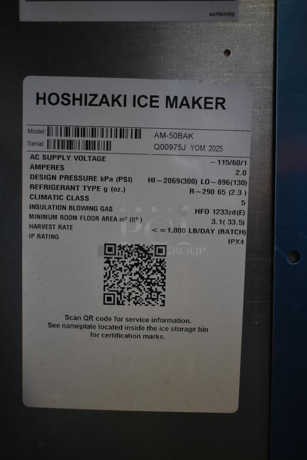 Hoshizaki AM-50BAK ice maker label showing model, serial number, voltage, refrigerant type, and QR code for service info.