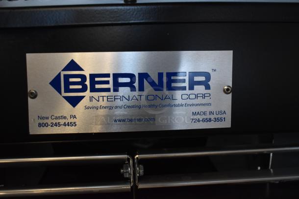Brand new Berner Air Curtain model SLC07-1072AA-BK, 72" black, 120V, with label showing sanitation certification and contact info.