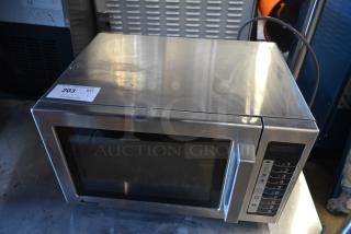 2017 Amana RCS10TS stainless steel commercial microwave, push button controls, 120V, visible label marked "203".