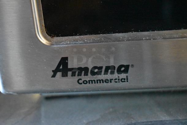 2017 Amana RCS10TS stainless steel commercial microwave, stackable, push button controls, 120V, Amana logo visible.