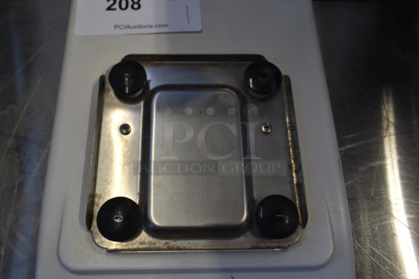 Bunn VPR Metal Countertop Scale base, shows four rubber feet and metal surface, with visible wear indicating used condition.