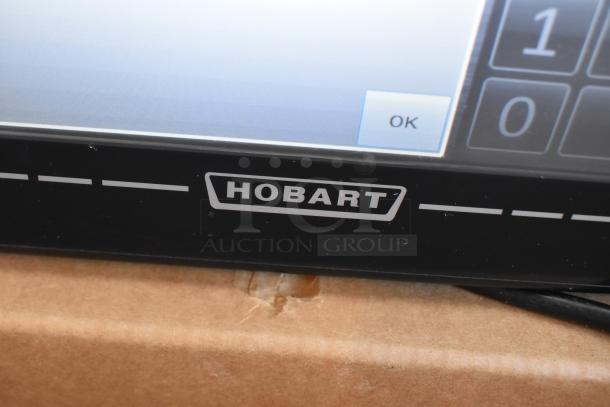 2017 Hobart HTi-7LH26 commercial food portioning scale, tested, working. Features a clear digital display and Hobart branding.