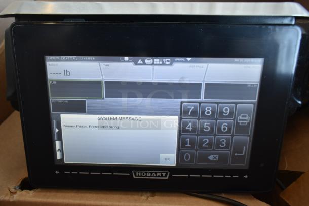 2017 Hobart HTi-7LH26 commercial countertop scale, digital display, tested, in working condition.