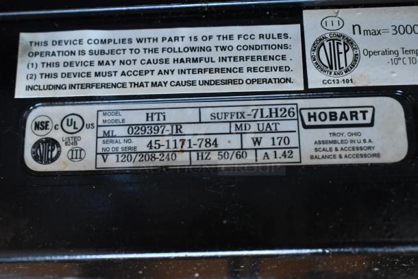 2017 Hobart HTi-7LH26 metal commercial countertop food portioning scale, tested, 120/208-240V, 1 Phase, model label shown.