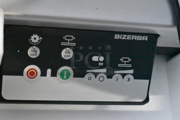 Control panel of 2023 Bizerba GSP HD Meat Slicer, featuring labeled buttons and indicators, showing brand and functions.
