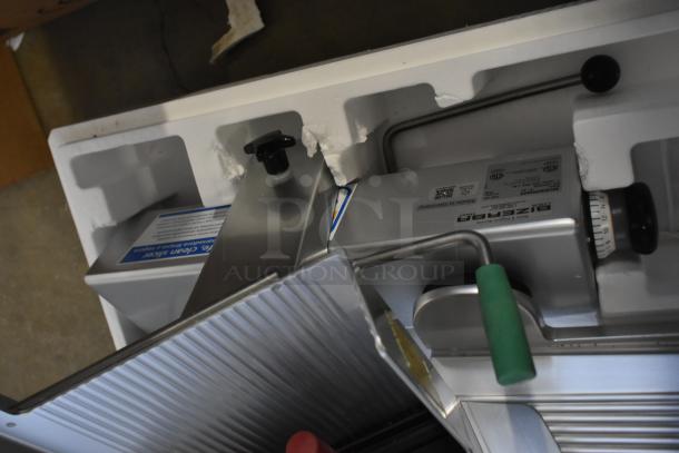 2023 Bizerba GSP HD 13" commercial meat slicer, heavy-duty metal, automatic gravity feed, 120V, shown in packaging.